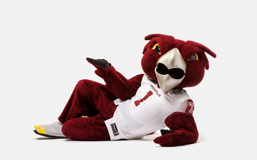 Temple's Mascot Laying down hooter the owl