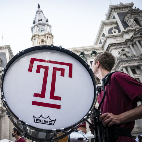 the Temple marching band performing in front of Philadelphia's city hall.
