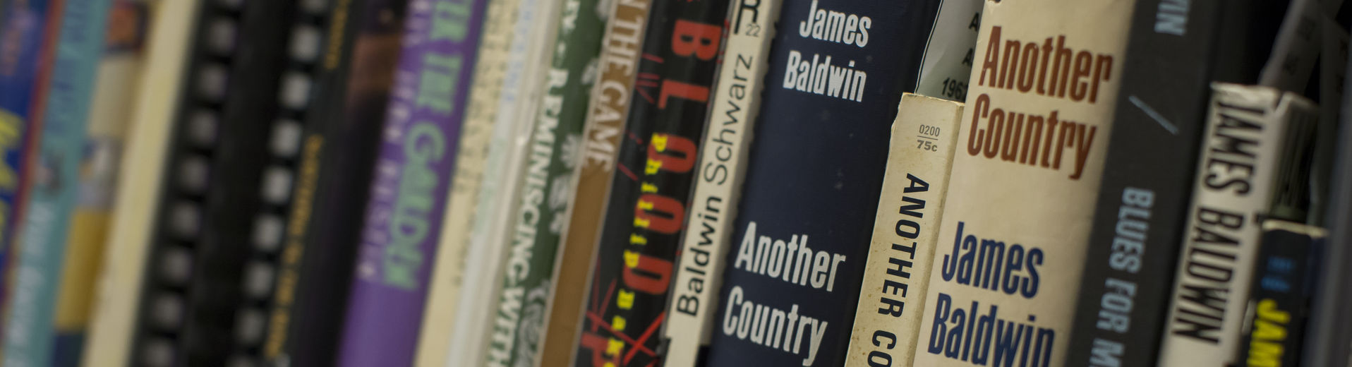 Books on a shelf in a library at Temple University