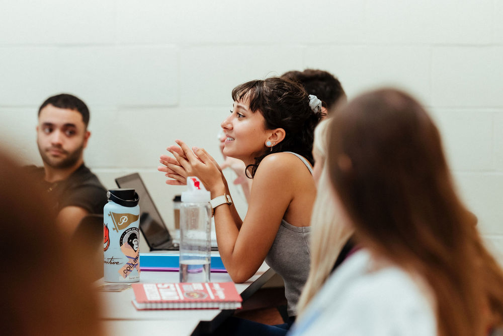 Students engaged in a classroom.