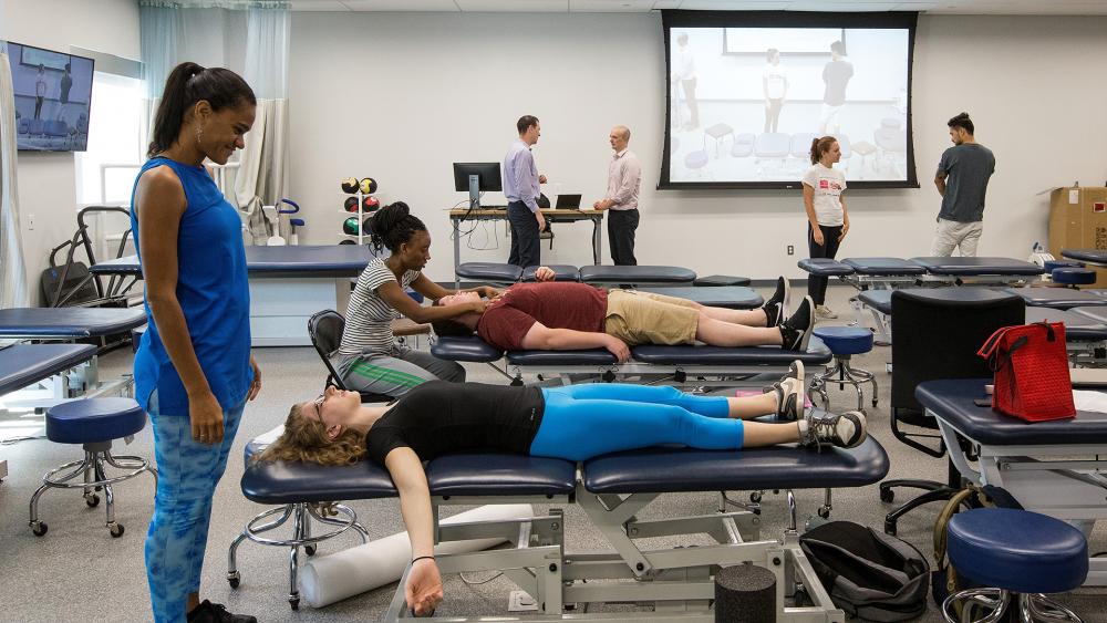 Physical therapy students in clinical practice space